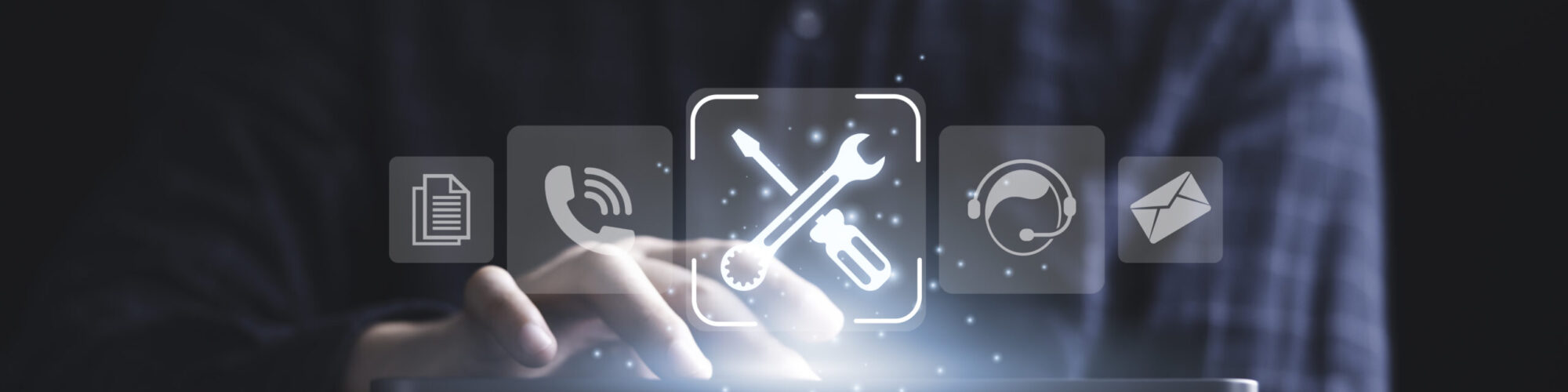 Businessman holding tablet with icon include wrench torque telep Businessman holding tablet with icon include wrench torque telephone operator and e-mail for customer service contact center and maintenance repair concept.